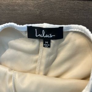 Lulus white jumpsuit crisscross open back.  No zippers.  Worn once